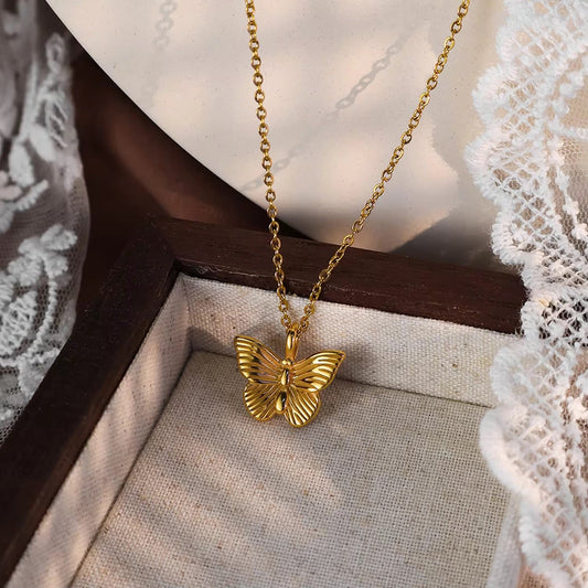 ✨Exclusive Stainless steel Gold Butterfly Pendant and tops set ✨